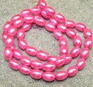 Glaspärlor klassiska risformade 6x8mm rosa