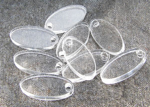 Plexiglas tag oval 9x20mm utan text 20st