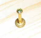 Labret guld med grön kristall