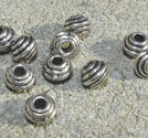 Mellandelar randiga bicones 6.5mm