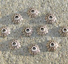 Pärlhattar antiksilver flikiga blommor 8mm 10st
