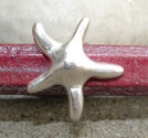 Regaliz metall sjöstjärna 18mm